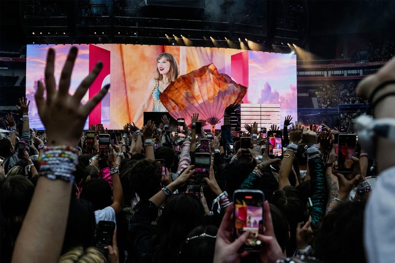 US singer and songwriter Taylor Swift performs on stage at the Groupama Stadium as part of The Eras Tour, in Decines-Charpieu, eastern France, on June 2, 2024. (Photo by JEFF PACHOUD / AFP) / -- IMAGE RESTRICTED TO EDITORIAL USE - STRICTLY NO COMMERCIAL USE --